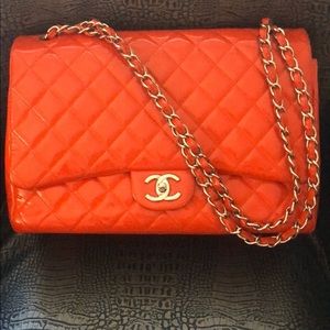 Flame red patent chanel bag.